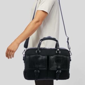 Tumi Black Leather Laptop Messenger Bag with Dual Front Pockets